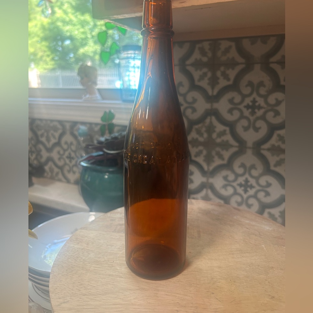 Vintage Amber Glass Bottle from “The Great American Tea Company” very cool!